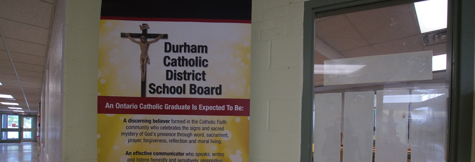 Stand-up sign stating the Catholic Graduate Expectations.